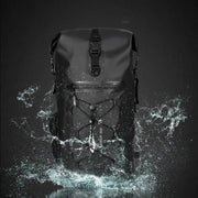LUMA AquaRider waterproof backpack splashed with water, showing waterproof design