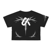 LUMA Graphic Crop Tee back flat lay showing lightning-root logo print
