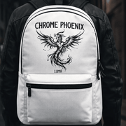 Close-up of the LUMA Chrome Phoenix backpack's tattoo-style phoenix graphic print worn on a person's back