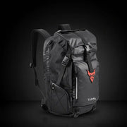 LUMA MotoPack Pro backpack front view, red logo badge, studio background