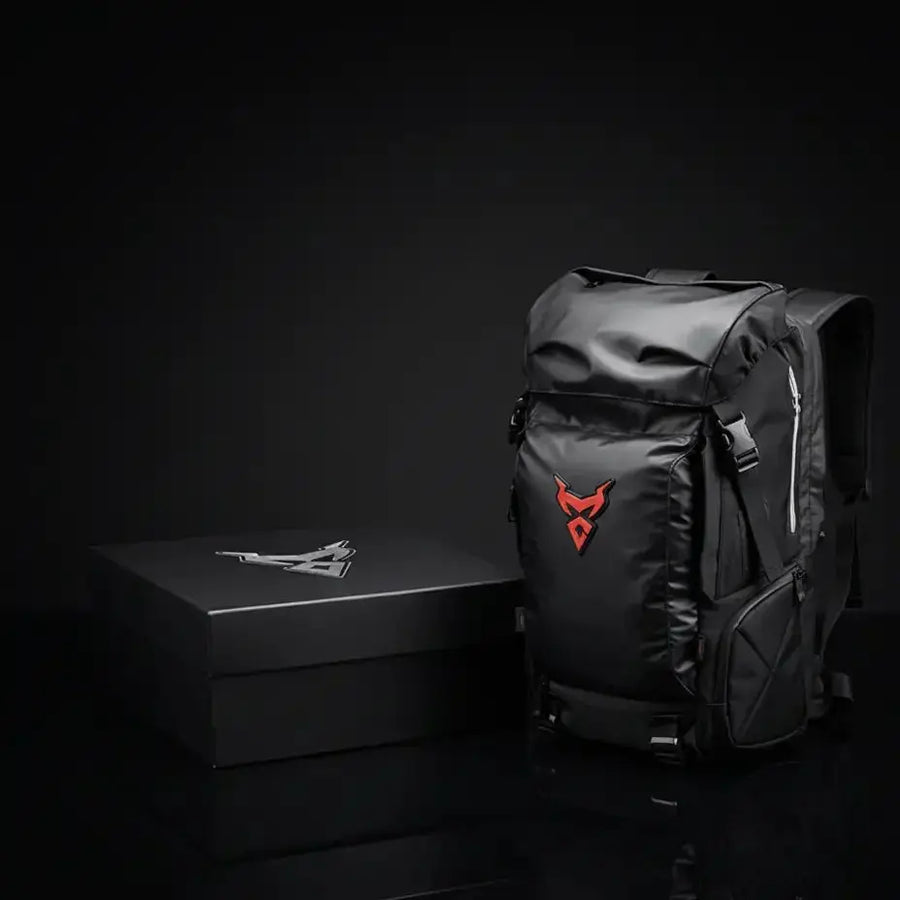 LUMA MotoPack Pro backpack and gift box, close studio shot