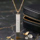 LUMA Hidden Message bar necklace engraved BALANCE, styled with a leather pouch and gold flakes