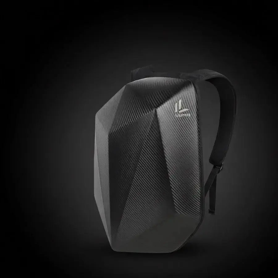 LUMA CarbonRide waterproof motorcycle backpack, front three-quarter studio shot