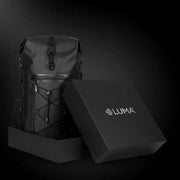 LUMA AquaRider backpack beside its branded LUMA gift box