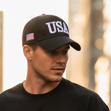 Man wearing black embroidered cap clean minimal streetwear outfit