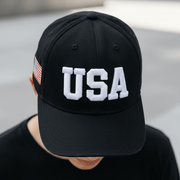USA embroidered cap close-up logo detail black cap texture
