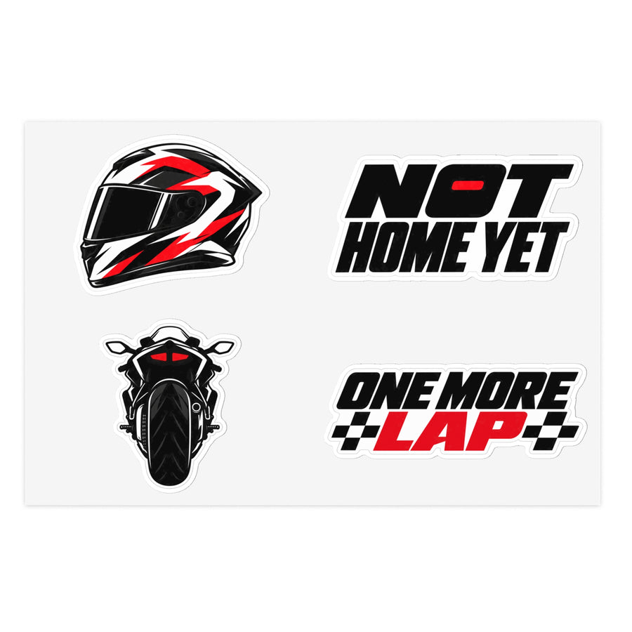 Vinyl sticker sheet with a racing helmet, NOT HOME YET, a sportbike rear view and ONE MORE LAP stickers (mockup)