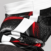 Close-up of a black, red and white patterned motorcycle neck gaiter folded at the collar