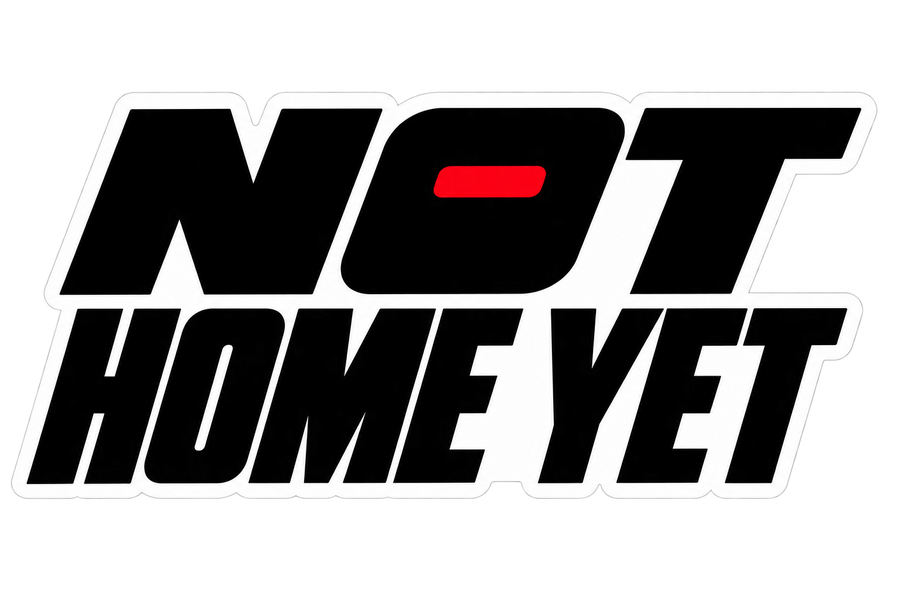 Not Home Yet bold black and red text vinyl sticker design