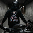 Motorcycle rider in a LUMA Graffiti Bear hoodie, showcasing bold streetwear style for American sportbike riders.